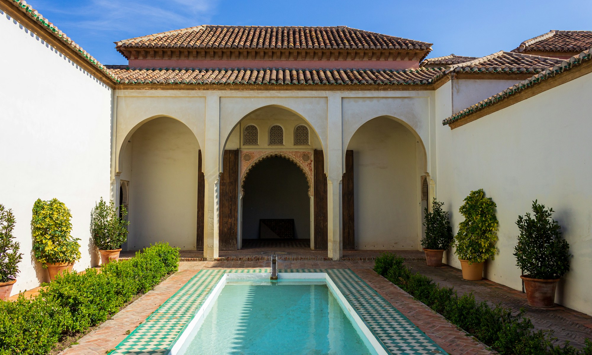 Andalusian courtyard with tiled fountain at the Alcazaba in Málaga